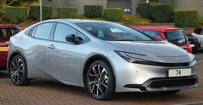 2024_Toyota_Prius_Excel_PHEV_-1987cc_2.0(225PS)Plug-in_Hybrid-Silver_Metallic-_10-2024,_Front_Quarter