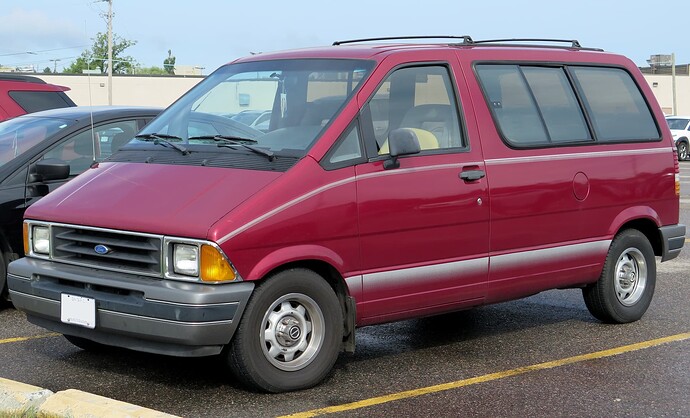 1991_Ford_Aerostar_XL_in_Electric_Currant_Red,_Front_Left,_09-13-2022